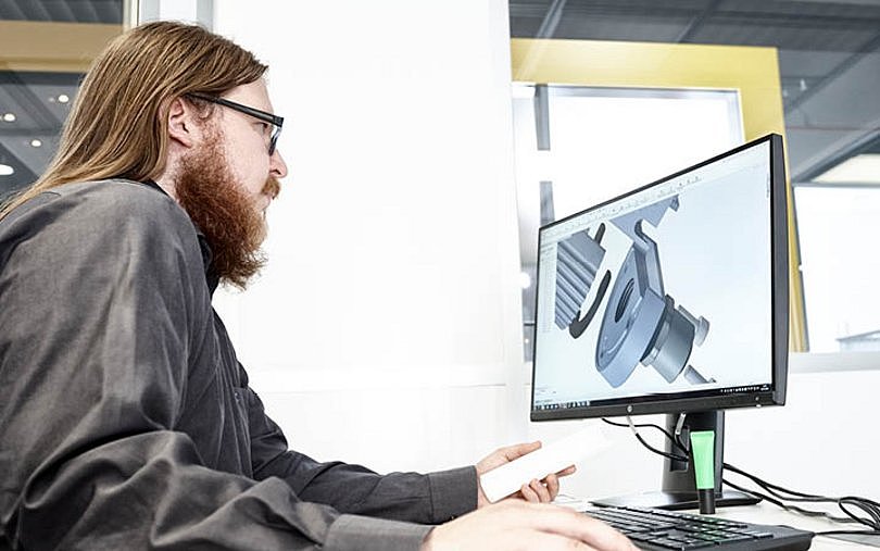 A developer creating innovative designs with precision and expertise.